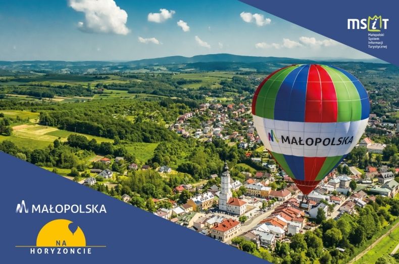 Grafika promocyjna akcji, balon Małopolski na tle nieba