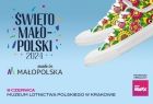Napis Święto Małopolski 2024. Kolorowe trampki na niebieskim tle